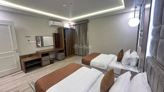 2 Bedroom Apartment for Rent in Al Manar, Dammam - Two-bedroom apartment with a living room, kitchen, and two bathrooms