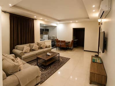 2 Bedroom Flat for Rent in Al Hamra, Al Khobar - Two-bedroom apartment with a living room and kitchen, one king-size bed and two single beds Unit 1