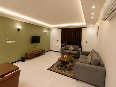 2 Bedroom Apartment for Rent in Al Hamra, Al Khobar - Two-room apartment with a living room, kitchen, lake view, one king-size bed& two single beds unit 1