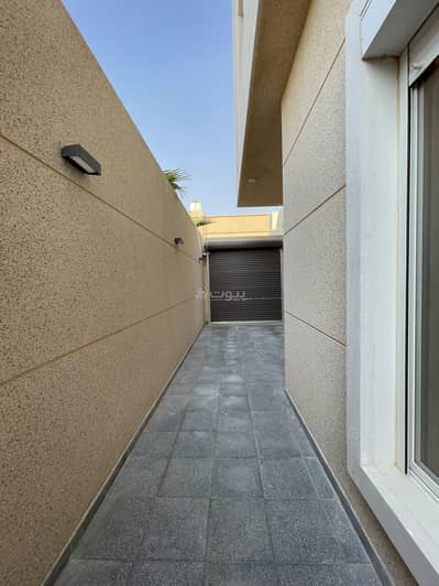 3 Bedroom Apartment for Rent in North Riyadh, Riyadh - A luxurious and modern ground-floor villa with a car entrance, a big yard, and a private entrance
