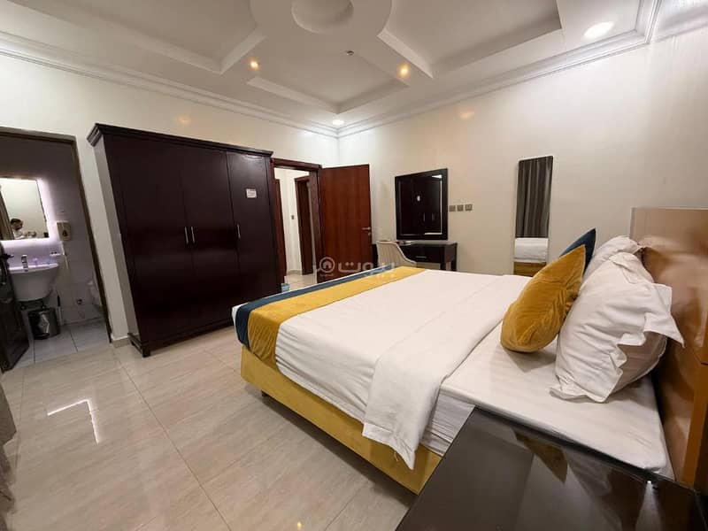 Two-bedroom apartment with a living room, a kitchen, and two bathrooms Two-bedroom apartment with a living room, a kitchen, and two bathrooms