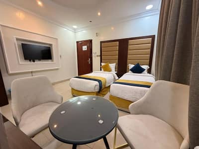 1 Bedroom Flat for Rent in Al Faisaliyah, Dammam - Apartment with one bedroom, a living room, and a bathroom