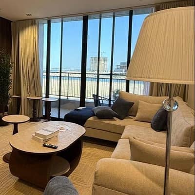4 Bedroom Apartment for Rent in Sports City, Al Khobar - An apartment with four bedrooms and a living room with a sea view