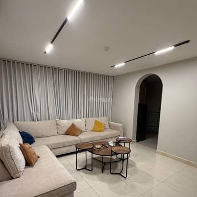 2 Bedroom Flat for Rent in Al Shati Al Sharqi, Dammam - Two-Bedroom Apartment and Living Room