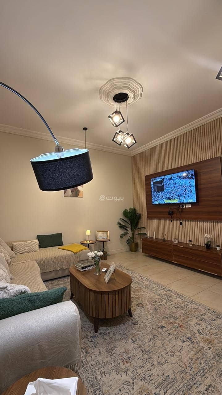 A comfortable one-bedroom apartment with a living room A comfortable one-bedroom apartment with a living room