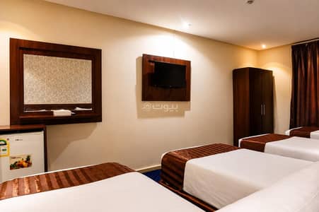 1 Bedroom Apartment for Rent in Al Utaybiyyah, Makkah - Room with four single beds Unit # 28
