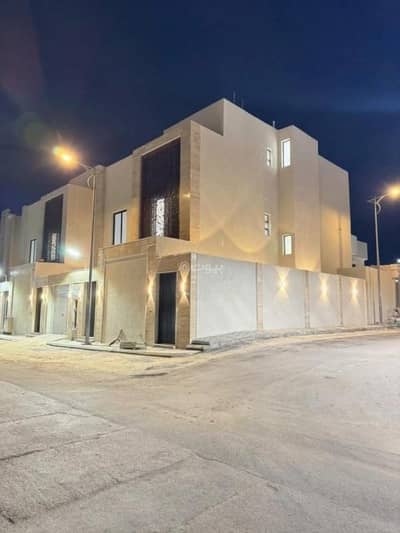5 Bedroom Villa for Sale in West Riyadh, Riyadh - A penthouse apartment with a staircase in the hall and an apartment for sale west of Riyadh