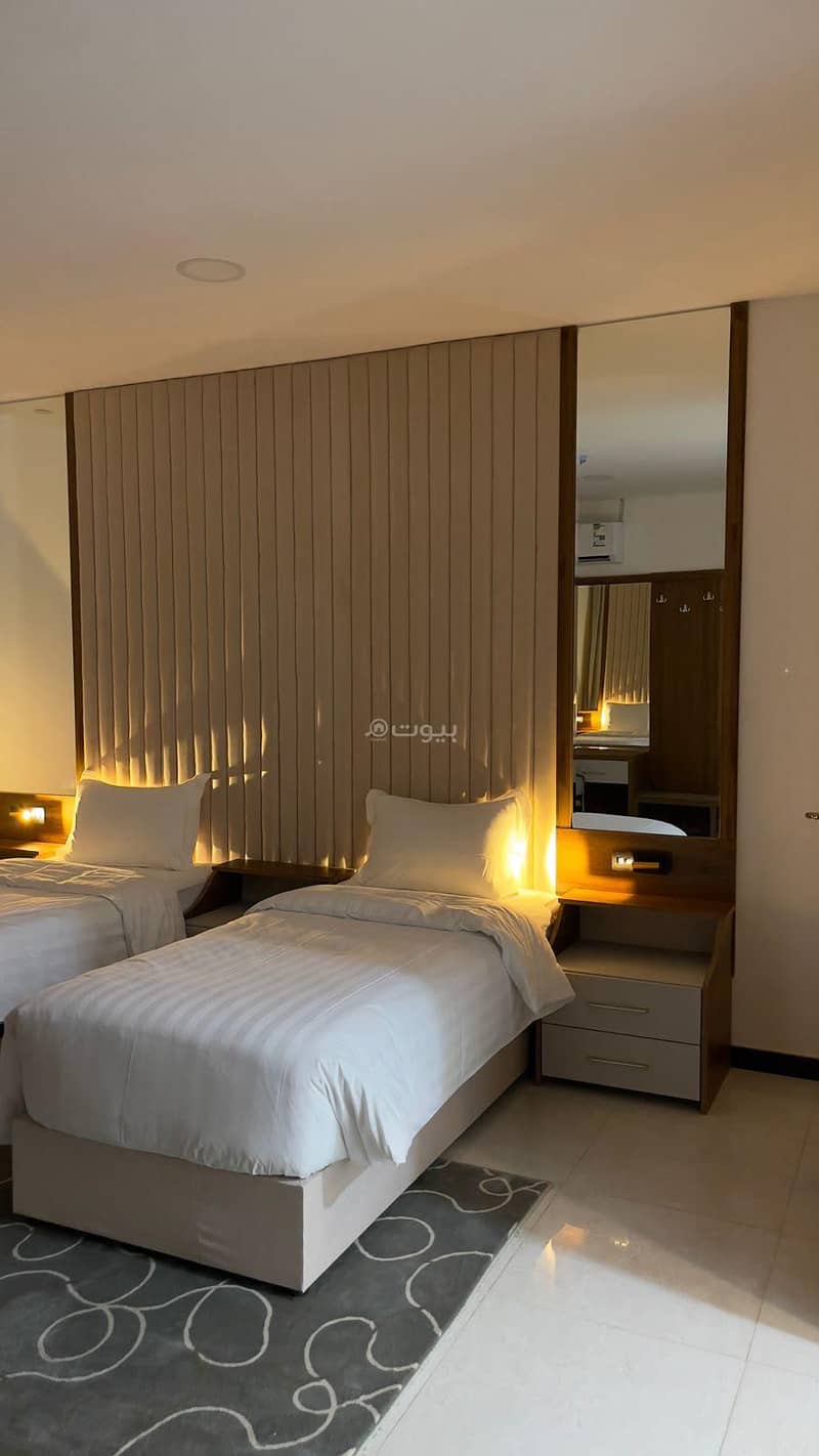 Three rooms lounge kitchen with king size bed and four single beds Three rooms lounge kitchen with king size bed and four single beds