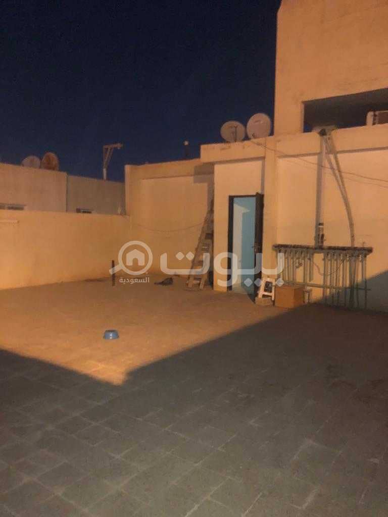Apartment with a large roof for rent in Al Rimal, east of Riyadh