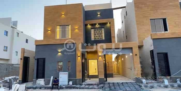 Indoor staircase villa and 2 apartments for sale in Al Munsiyah, east of Riyadh