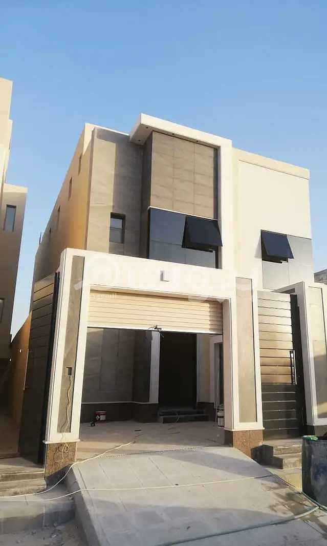 Villa with stairs in the hall and a sophisticated apartment for sale in Al Qirawan, Riyadh