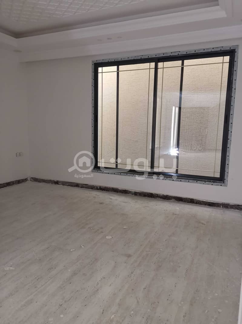 Villa Stairs in the hallway And 2 Apartments For Sale in Al Munsiyah, East of Riyadh
