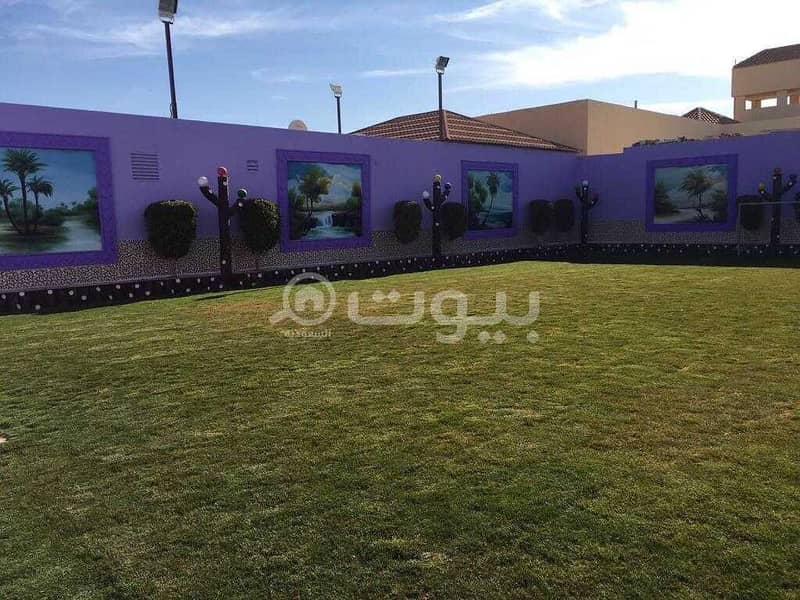 Complex of istiraha and chalets with a pool for sale in Al Muzahimiyah, Riyadh