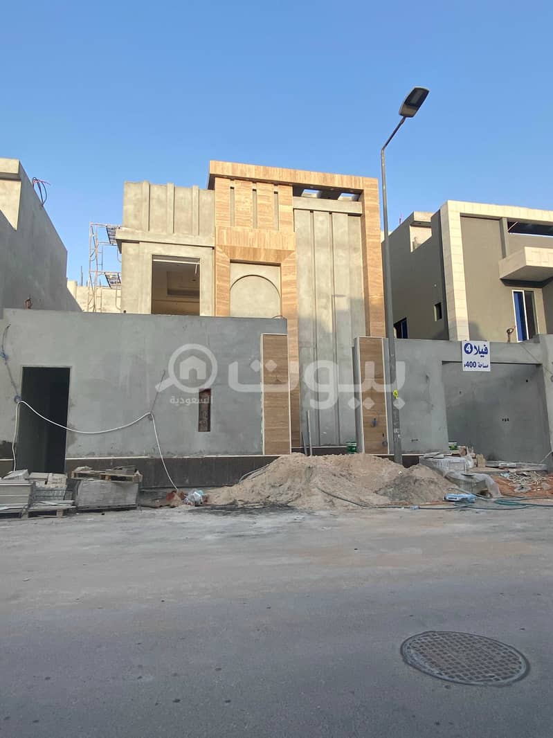 Villa with roof for sale in Al Yasmin district, north of Riyadh
