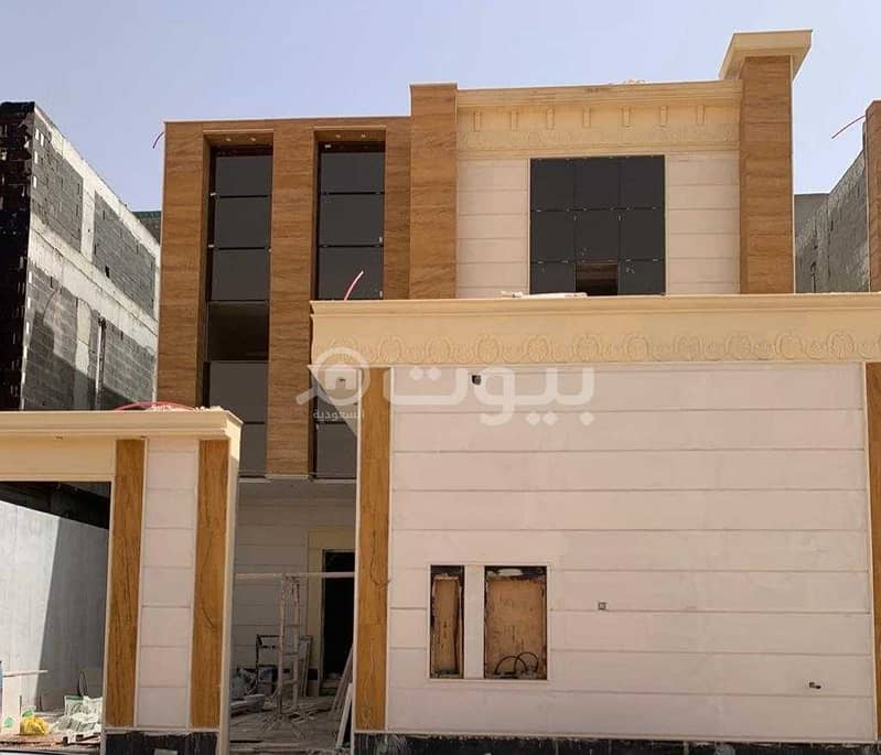 Villa for sale in Al Maizilah district, east of Riyadh | Internal staircase and 2 apartments
