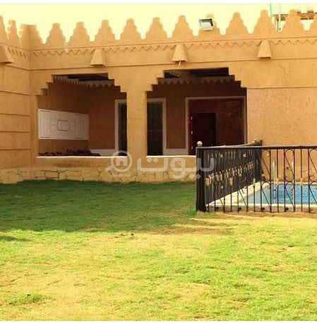 For rent a luxurious chalet with a traditional design in Al Qirawan, North of Riyadh