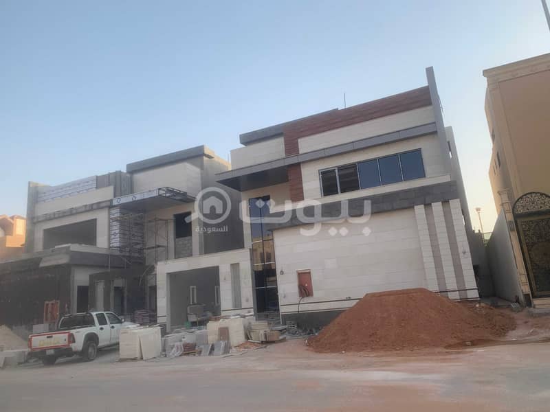Two villas with an internal staircase and an apartment for sale in Qurtubah, east of Riyadh