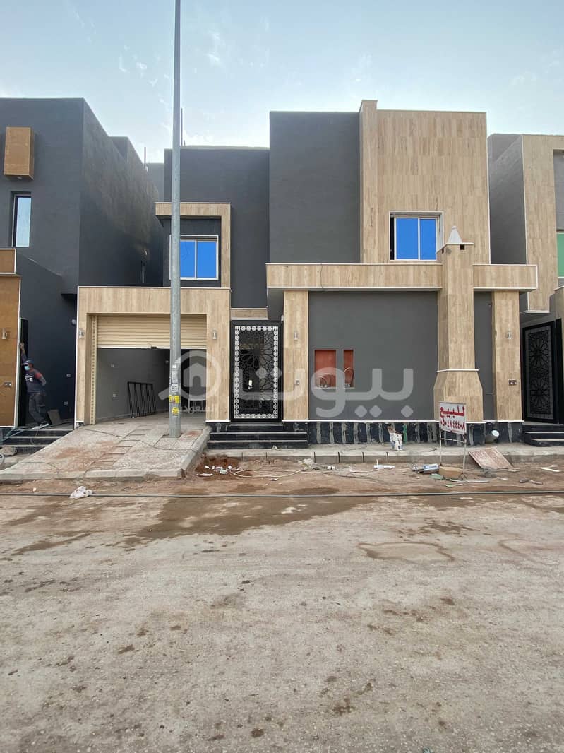 Internal staircase villa and apartment for sale in Al Rimal, East Riyadh