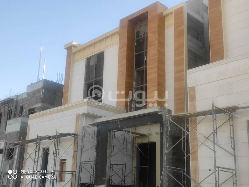 Indoor staircase villa and apartment for sale Al Rimal, East Riyadh