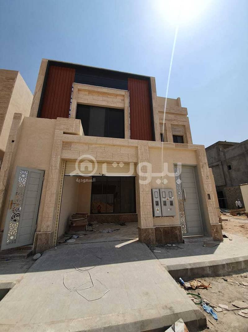 An interior staircase villa and 2 apartments in Al Munsiyah, East Riyadh