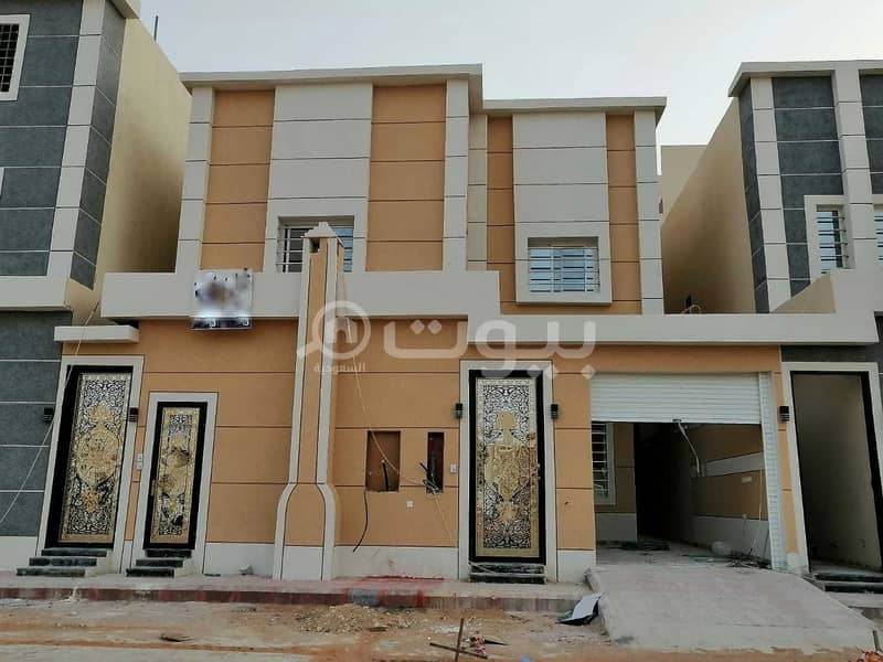 An interior staircase villa with 2 apartments for sale in Al Rimal, East Riyadh