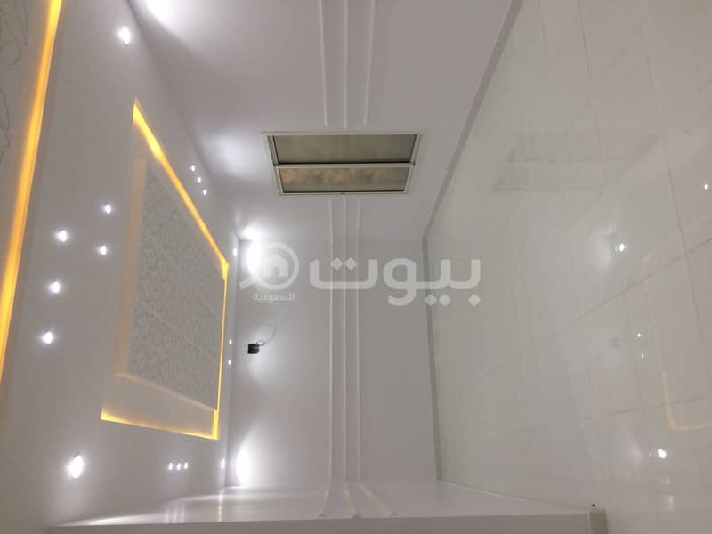 Indoor staircase villa and apartment for sale in Al Rimal, east of Riyadh