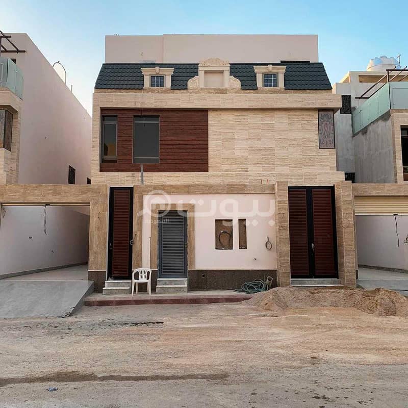 Villa with stairs in the hallway for sale in Al Qirawan, North Riyadh