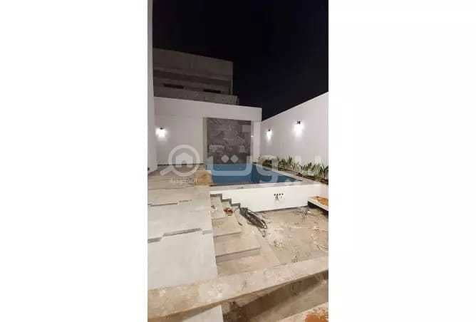 For sale, a luxury finished villa in Al-Malqa district, north of Riyadh | with swimming pool