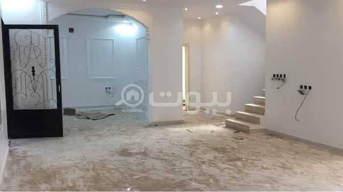 Villa for sale in Al-Rimal, east of Riyadh | Internal stairs and 2 apartments