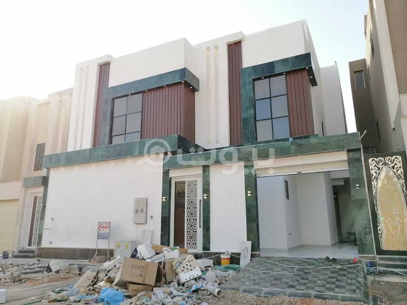 Villa with internal stairs and apartment for sale in Al Rimal, east of Riyadh