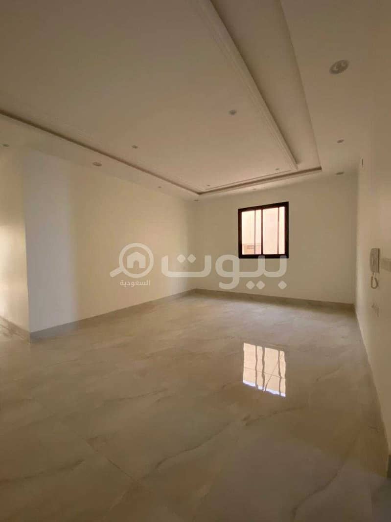 Luxury villa with stairs and an apartment for sale in Al Narjis, north of Riyadh