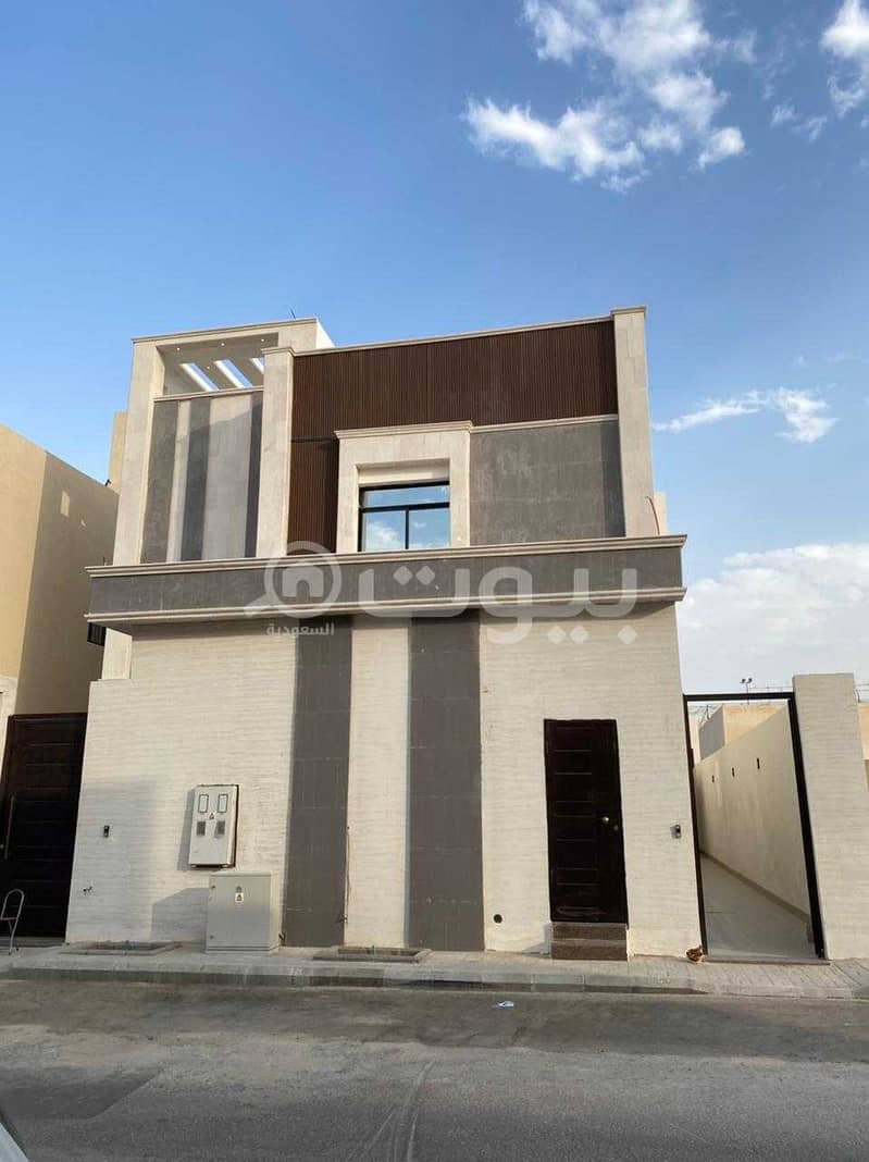Luxury villa with stairs and an apartment for sale in Al Narjis, north of Riyadh | 450 sqm