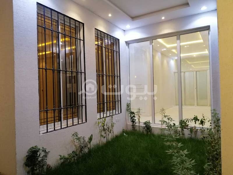 Villa for sale in Al-Yarmuk district, east of Riyadh | with 2 apartments