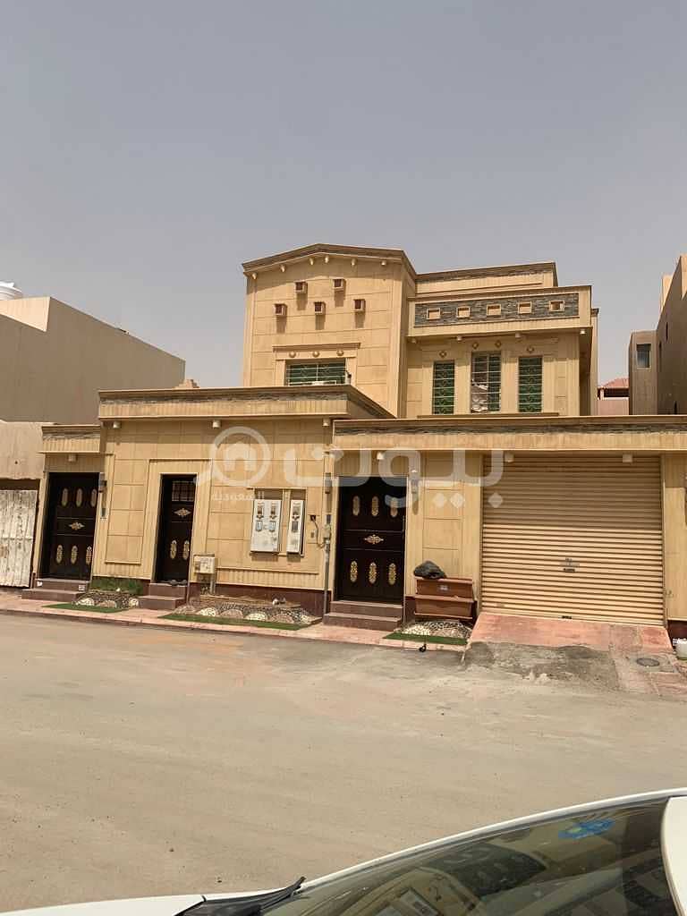 Villa with internal stairs and two apartments for sale in Qurtubah, East Riyadh