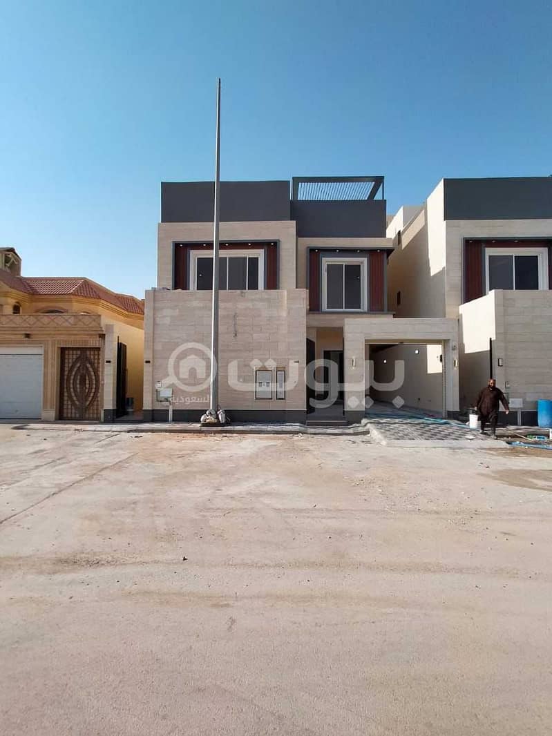 Villa with internal stairs and two apartments for sale in Qurtubah, East Riyadh