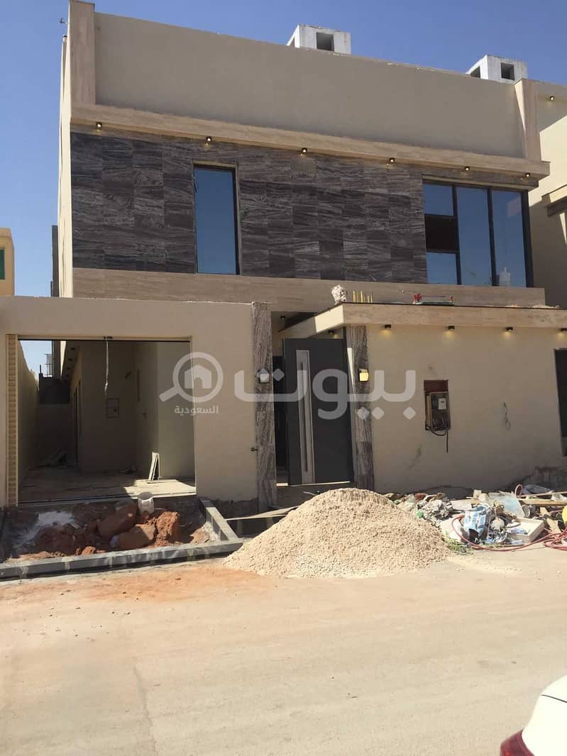 Villa with internal stairs and an apartment for sale in Ishbiliyah, East Riyadh