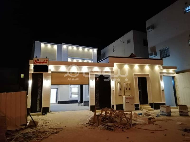 Villa with internal stairs and two apartments for sale in Al Rimal, East Riyadh