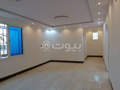 6 Bedroom Villa for Sale in Riyadh, Riyadh Region - Modern Villa Stairs in the hall with apartment for sale in Al Aziziyah, South Riyadh