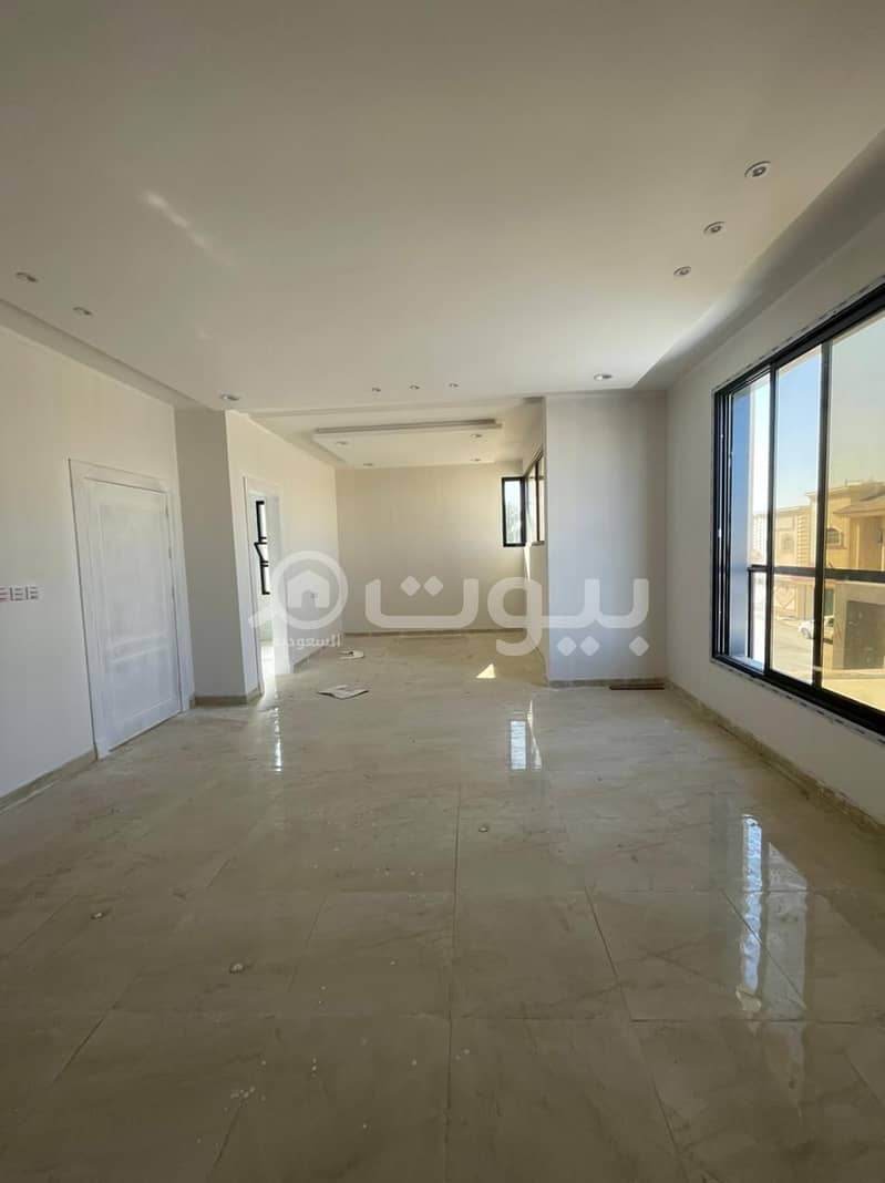 2 modern villas with stairs and an apartment for sale in Ishbiliyah, east of Riyadh