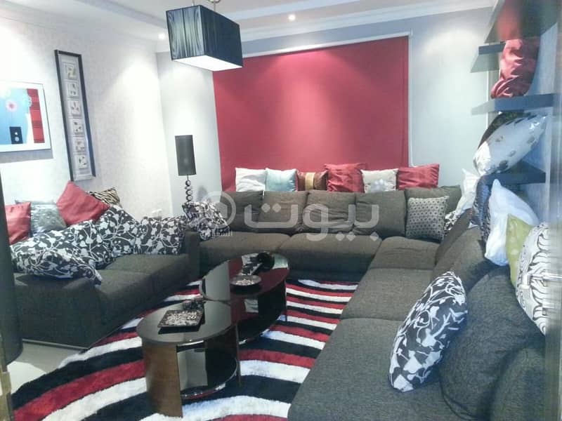 A luxuriously furnished apartment for sale in Al Hamra district, east of Riyadh