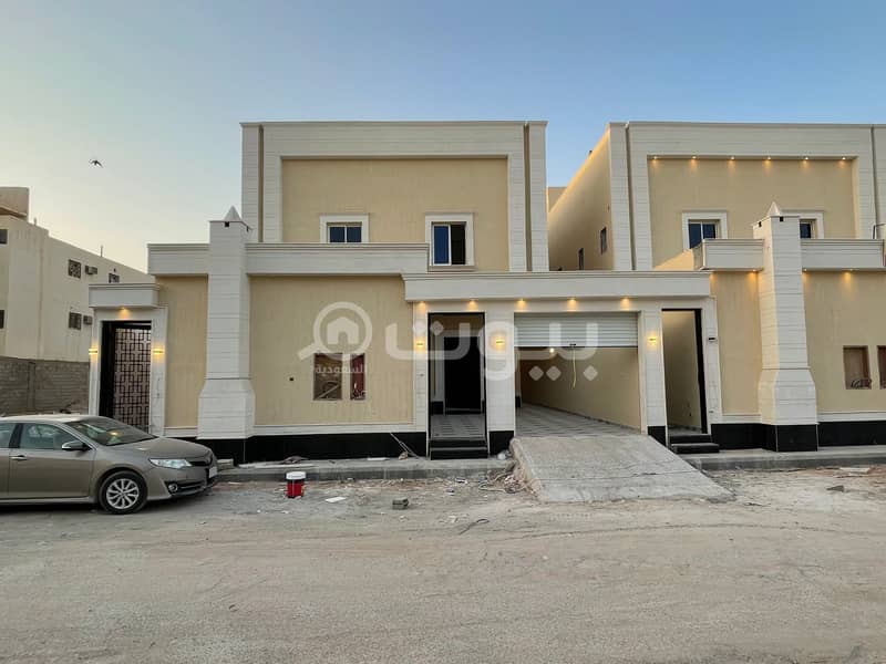 Villa with internal stairs and 2 apartments in Alawali, West Riyad