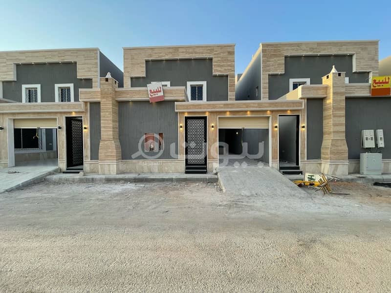 Villa with internal stairs and 2 apartments in Al Rimal, east of Riyadh