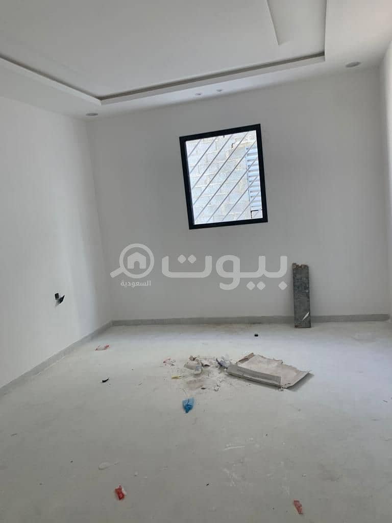 Internal staircase villa with an apartment for sale in Al Yarmuk district, east of Riyadh
