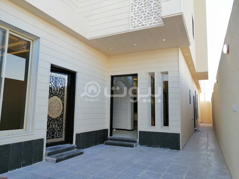 Villa with internal stairs and two apartments for sale in Al Rimal, East Riyadh