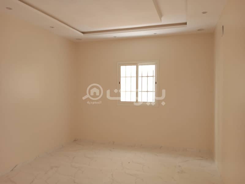 Villa with internal stairs and two apartments for sale in Al Rimal neighborhood, east of Riyadh
