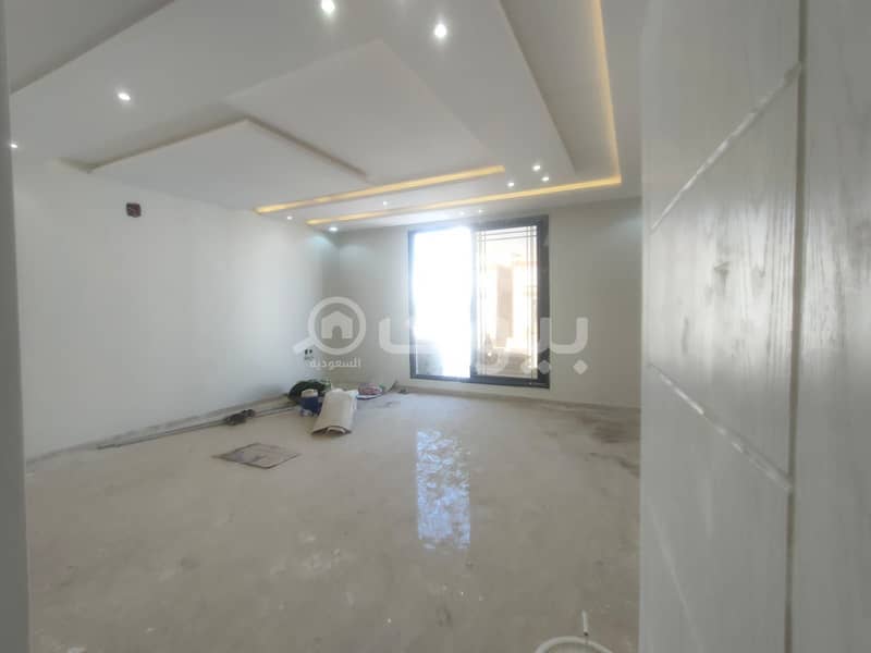 Luxury villa for sale with a staircase in the hall and two apartments in Al-Rimal, east of Riyadh