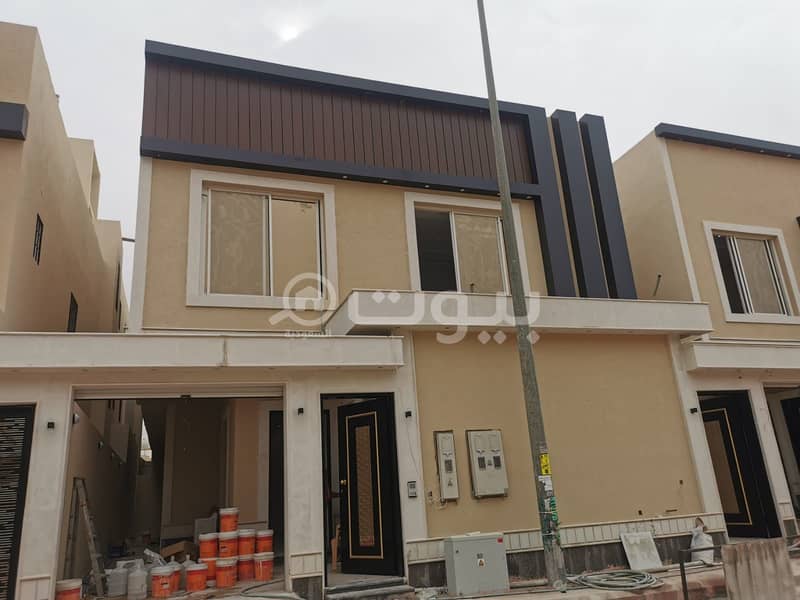 Villa with internal stairs and 2 apartments in Ishbiliyah, East Riyadh