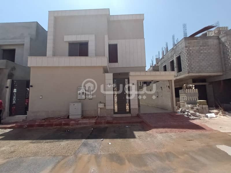 Villa with internal stairs and two apartments for sale in Al Munsiyah, East Riyadh