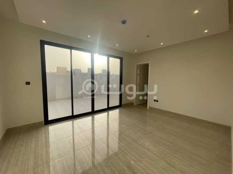 Second floor apartment with roof for sale in Al Munsiyah district, east of Riyadh