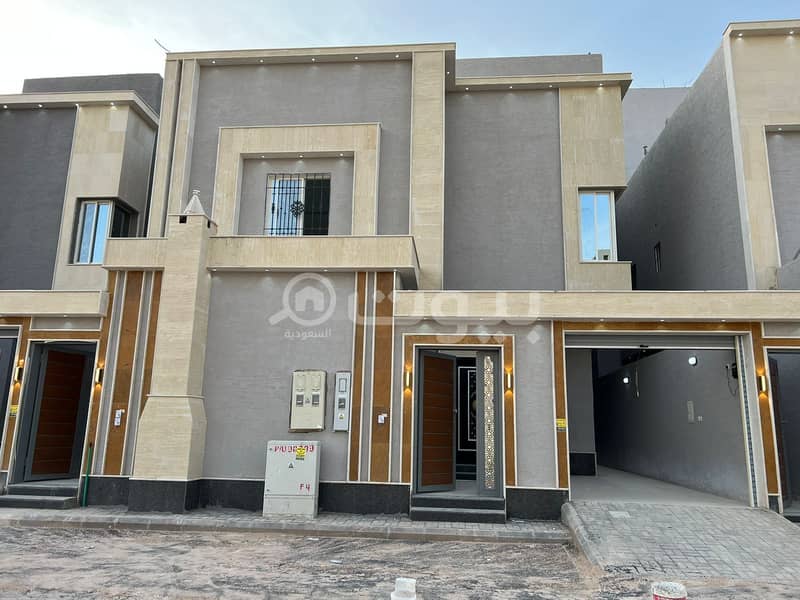 Villa with internal stairs and two apartments for sale in Al-janadriyah neighborhood, east of Riyadh